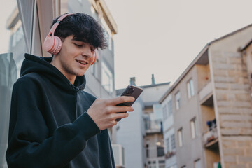 teenager with mobile phone and headphones