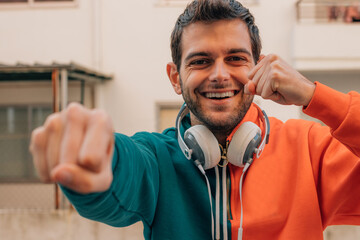 young man smiling excited celebrating success