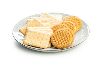 Butter biscuits on plate. Sweet cookies isolated on a white background.
