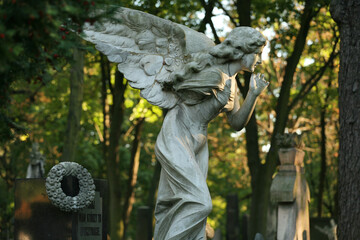 A tombstone sculpture at the Powazki (Pow¹zki) Cemetery, Warsaw, Poland