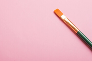 Paint brushes isolated on pink  background. For art
