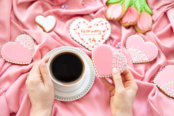 background banner greeting card for international women day with eight number and cup of coffee in woman hands, tulips and pigeon shape gingerbread cookies on silk fabric background