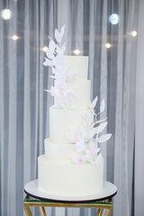 Delicious sweet layered fresh cake for the holiday with beautiful decorations