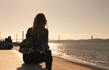 Woman gazing at the sunset