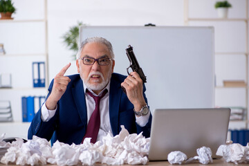 Old male employee in brainstorming concept