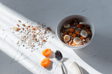 Delicious healthy muesli with fruits, top view. Raw vegan food