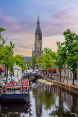 Fototapeta na wymiar Delft canals and New church tower, Netherlands