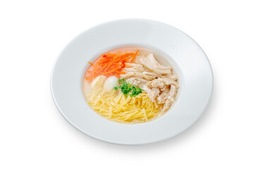 Classic chicken soup with egg and pasta in a plate on a white isolated background. Top view, copy space.