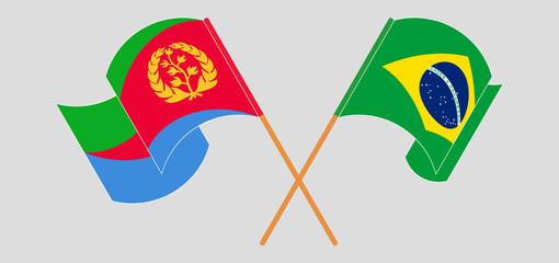 Crossed and waving flags of Eritrea and Brazil