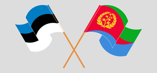 Crossed and waving flags of Estonia and Eritrea