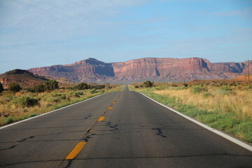 The long old country road to the monument mesa at the end