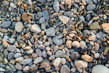 gray pebbles. pebble beach. stones for landscape design. background.