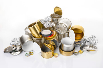 Pile of Separate collected metal garbage. Iron stuff for recycle on white background. Eco friendly concept. Recyclable metal waste: tin cans, foil, steel covers. Zero waste concept. Save the planet