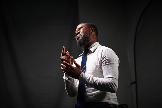 Man speaking with sign language in a studio