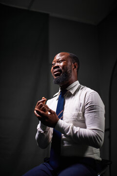 Man speaking with sign language in a studio