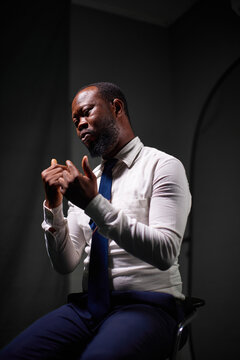 Man speaking with sign language in a studio