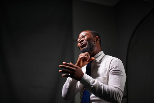 Man speaking with sign language in a studio