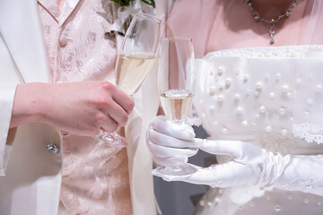 The bride and groom are toasting