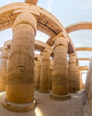 Decorated columns of the Great Hypostyle Hall in the Amun Temple enclosure in Karnak, Egypt