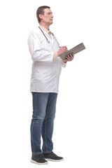 Side view of concentrated male doctor writing reports