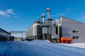 Agricultural silos elevator for drying, cleaning and storage grain in winter © Mulderphoto