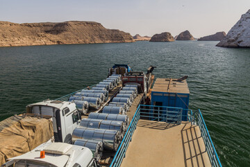 Obraz premium Trucks on a ferry crossing Lake Nasser, Egypt
