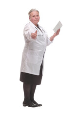 Side view of a doctor using a tablet computer - isolated over a white background