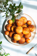 Fried doughnuts on a plate. Top view.