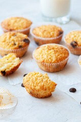 Homemade easy muffins with chocolate chips and glass of milk.