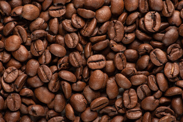 Coffee beans filling the screen, Top view.