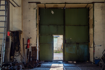 open iron door inside the warehouse