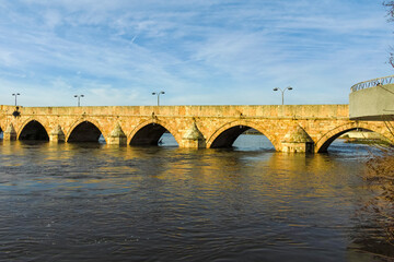 Fototapeta premium SVILENGRAD, BULGARIA - JULY 19, 2020: Sixteenth century Mustafa Pasha Bridge (Old Bridge) over Maritsa river in town of Svilengrad, Haskovo Region, Bulgaria