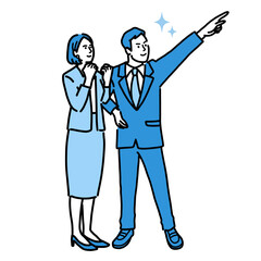 未来の方向に向かっているスーツを着た全身の若い男性と女性
