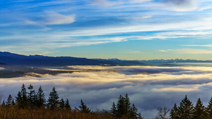 Dramatic cloud inversion over Fraser Valley, BC, as viewed from community of Univercity Highlands...
