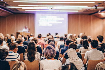 Audience in lecture hall on scientific conference. - obrazy, fototapety, plakaty