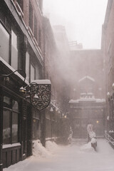 Alley in snowstorm