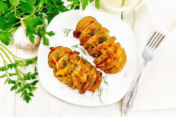 Potatoes puff smoked bacon in plate on board top