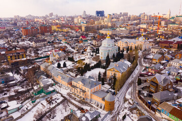 Aerial panoramic view of old quarters of Voronezh and Alekseev-Akatov Convent, one of oldest monasteries on winter day, Russia