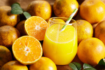 Fresh made orange juice from organic oranges in a glass