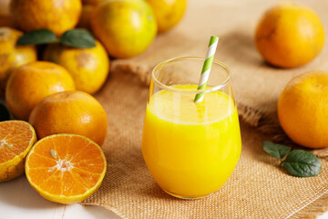 Fresh made orange juice from organic oranges in a glass