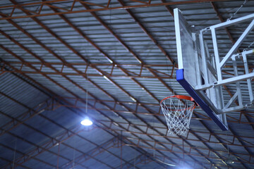 low angle view of basketball hoop in stadium. Basketball background © Gatot
