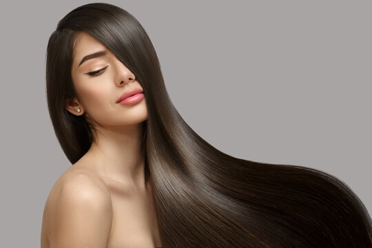 Fashion woman with straight long shiny hair. Beauty and hair care