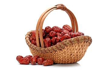 basket of red jujubes on white.