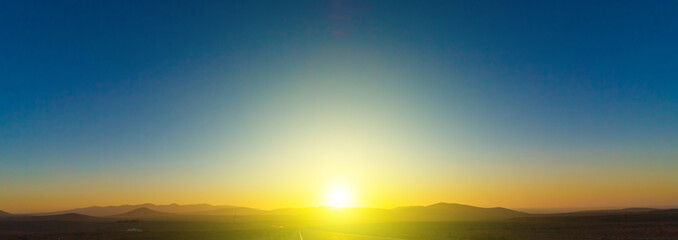 sunset sky panorama in hilly area