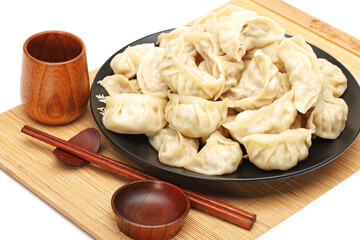 Chinese dumplings on white background