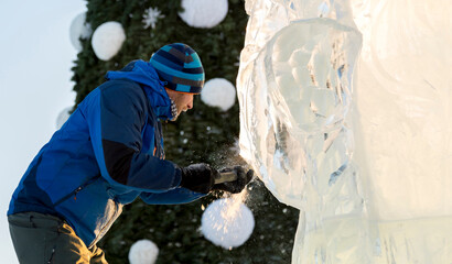 Portrait of a sculptor at work on a figure