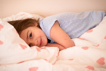 Obraz premium girl is sleeping in a bed
