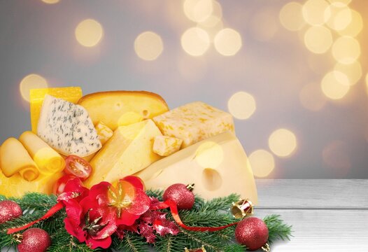 Christmas Cheese Platter With Nuts, Figs On Kitchen Desk. Xmas Gourmet Holiday Appetizer.