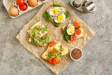 Tasty toasts on grunge background