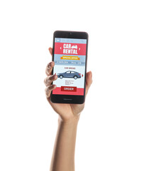 Woman holding mobile phone with open car rent app on white background